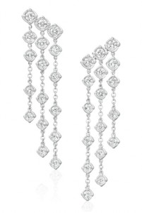 Three strands of diamonds dangling down from each earring