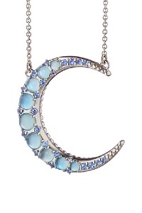 A crescent moon pendant with moonstone, sapphire, and topaz details