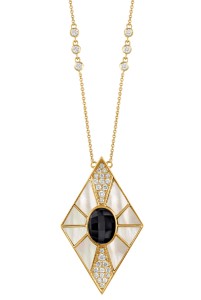 A yellow gold diamond pendant with mother of pearl and diamond details along with an oval faceted black onyx in the middle of the design for a splendid necklace