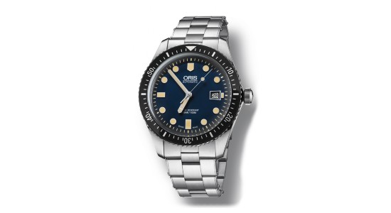 A silver and black Oris automatic watch with a deep blue dial