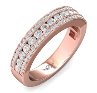 A channel anniversary band features diamonds and rose gold