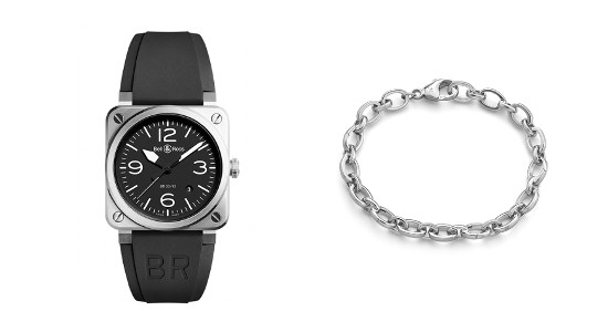 A silver and black Bell & Ross watch next to a silver chain bracelet