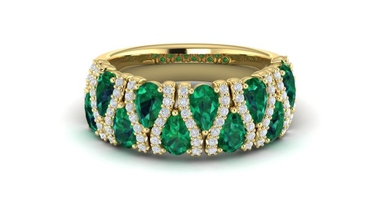 A yellow gold Vlora ring featuring emeralds and diamonds, available at Wilson & Son Jewelers.