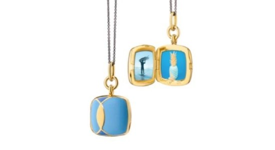 A yellow gold and blue enamel locket necklace, available at Wilson & Son Jewelers.