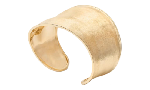 A sculptural yellow gold cuff bracelet from Marco Bicego, available at Wilson & Son Jewelers.