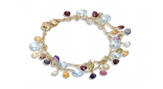 a yellow gold chain bracelet featuring a number of different colored gemstones