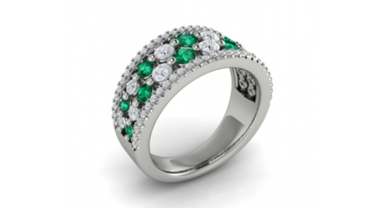 a white gold fashion ring featuring pave set emeralds and diamonds