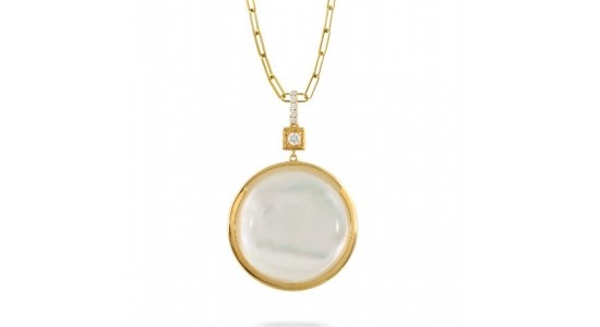a yellow gold pendant necklace featuring luminescent mother of pearl and diamond accents