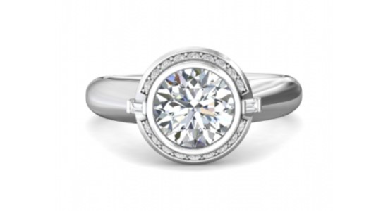 a round cut diamond ring with a bezel setting