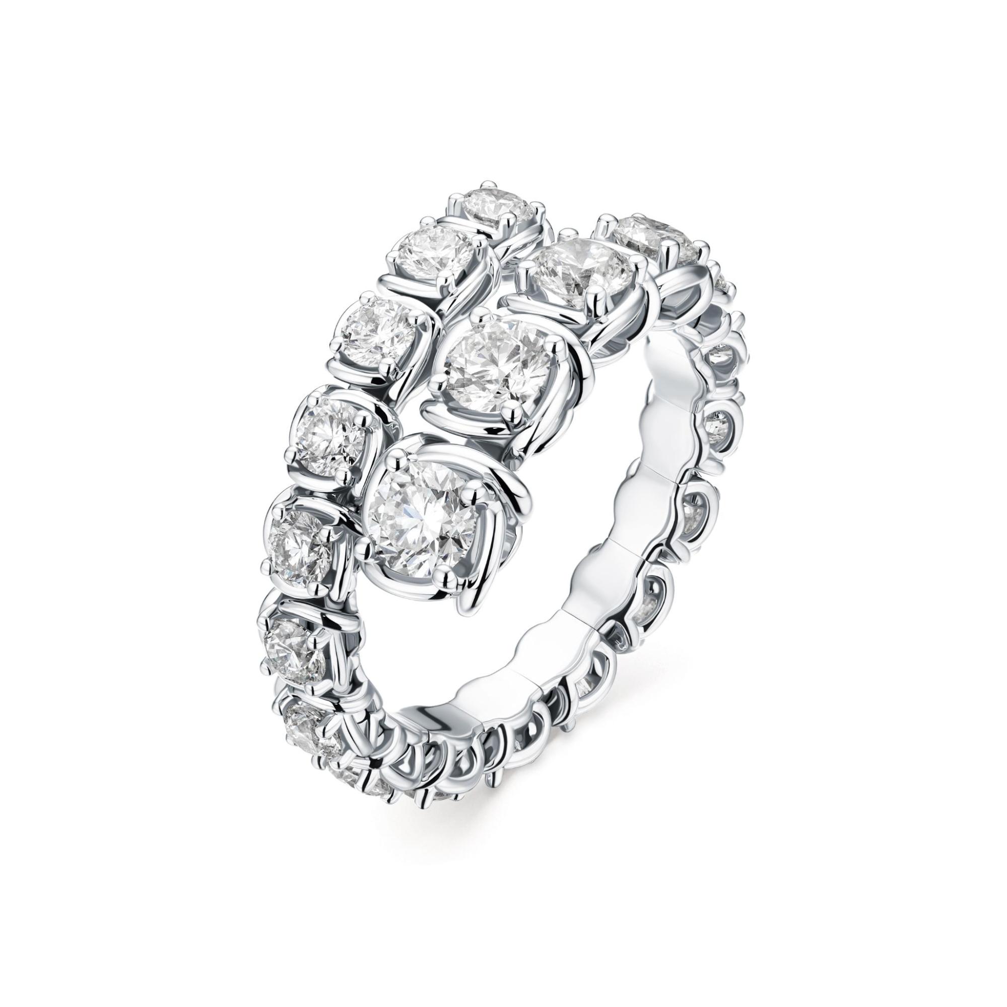 A white gold bypass ring with graduated diamonds