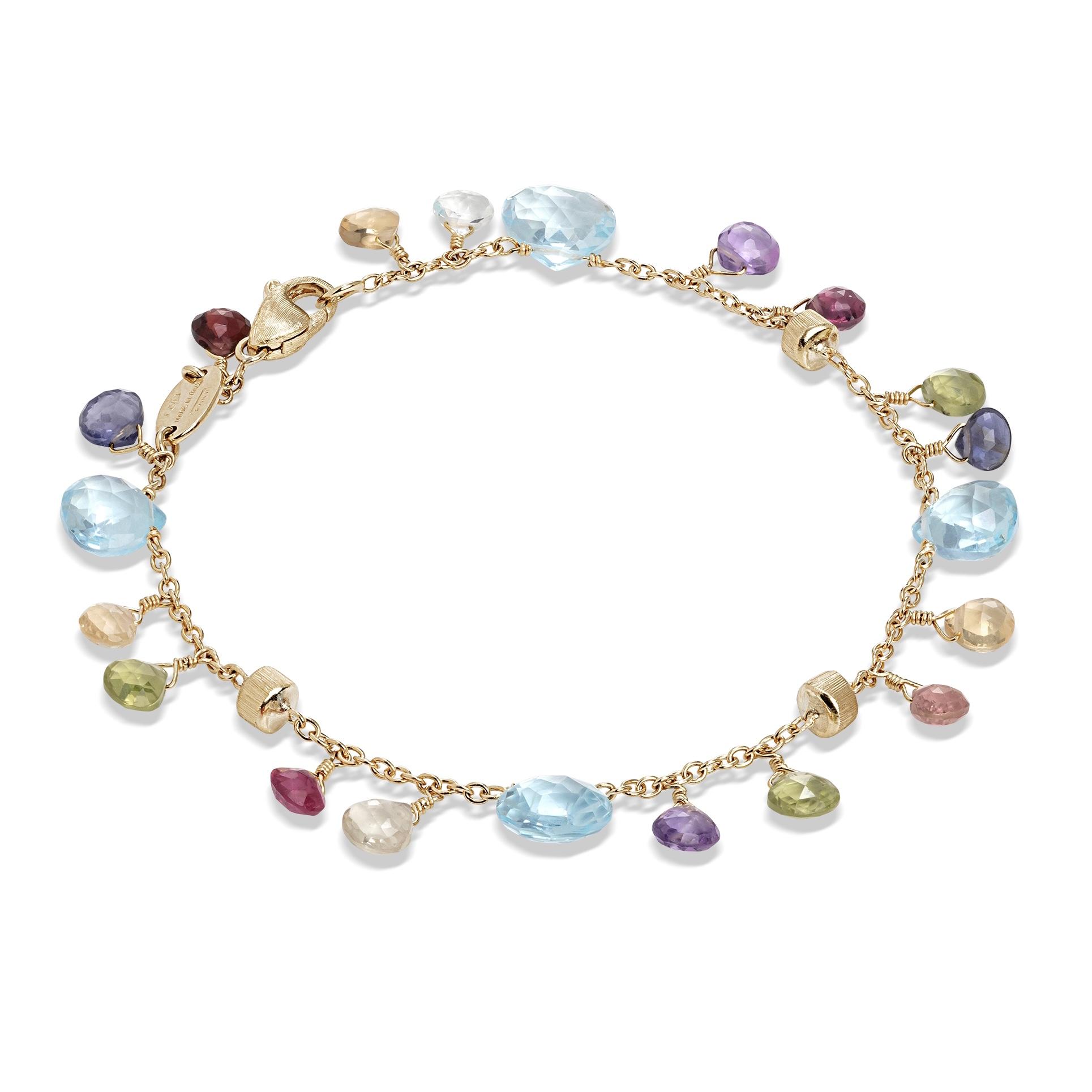 A yellow gold single strand gemstone bracelet
