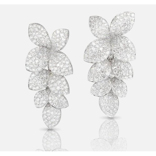 Elegant leaf-shaped diamond earrings arranged in clusters.