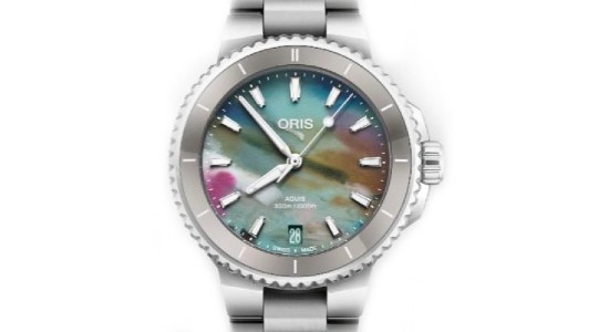 A silver-toned Oris watch with a colorful dial, available at Wilson & Son Jewelers.
