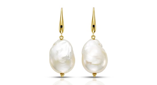 a pair of yellow gold drop earrings featuring freshwater pearls