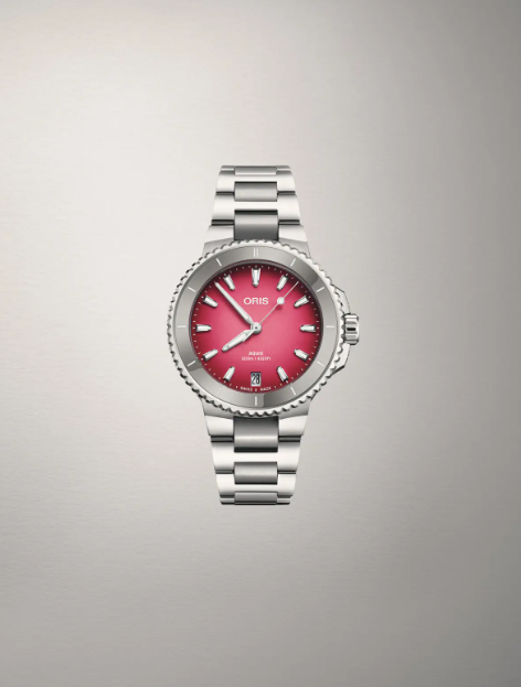 The Oris watch with pink dial and stainless steel bracelet