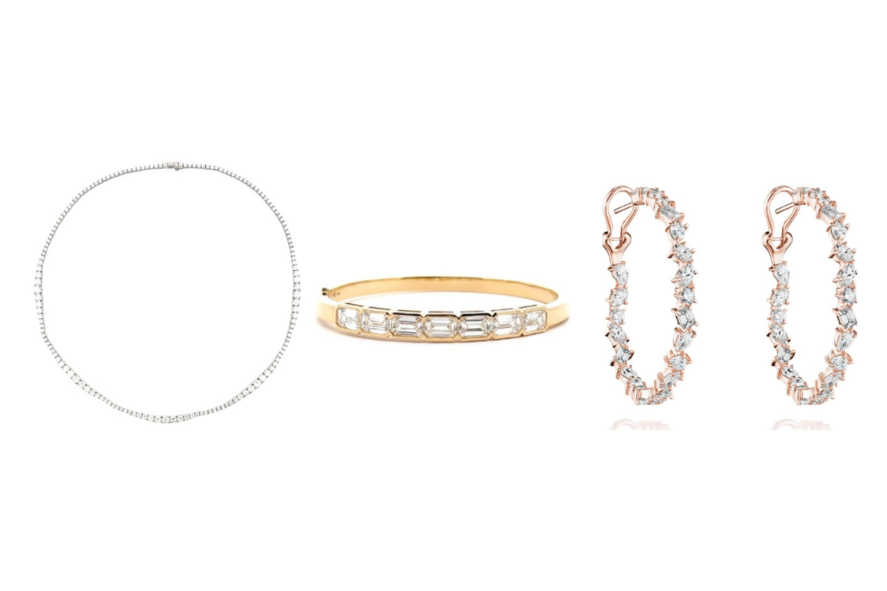 A diamond tennis necklace, yellow gold bangle with emerald cut diamonds, and diamond rose gold hoop earrings.