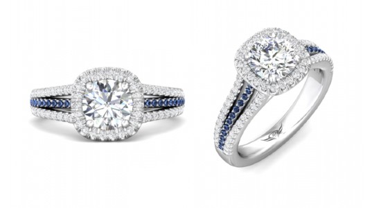 A Martin Flyer halo engagement ring with sapphire side stones, available at Wilson & Son Jewelers.