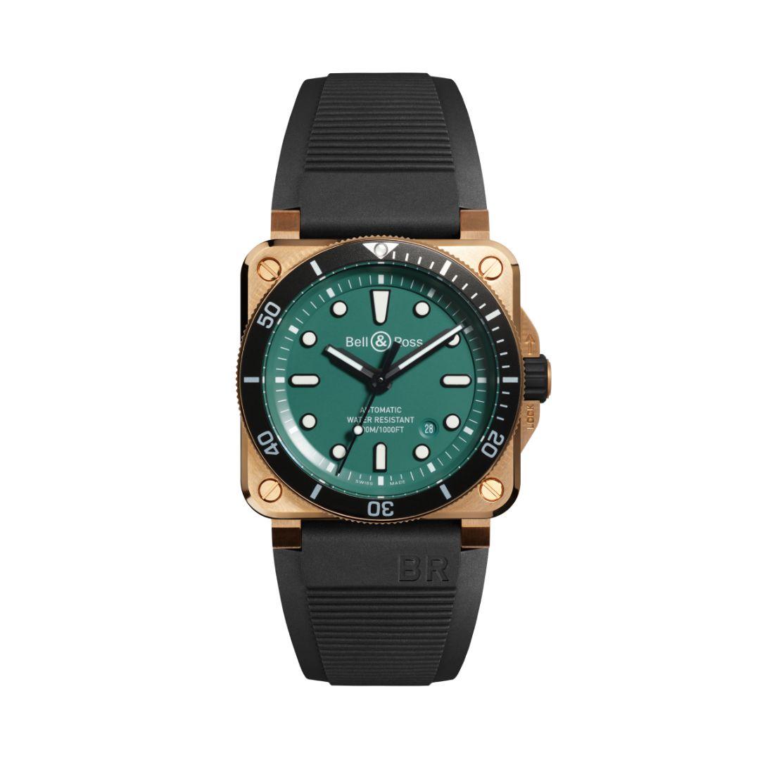 A Bell & Ross wristwatch with green dial and black rubber strap and bronze case