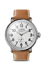 A Shinola Runwell watch with a leather strap and stainless steel case.