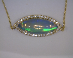 DJA GROUP 14 KARAT YELLOW GOLD DIAMOND AND MARQUISE OPAL PENDANT SET WITH ONE OPAL=6.01CT AND 38 DIAMONDS=.37CTW