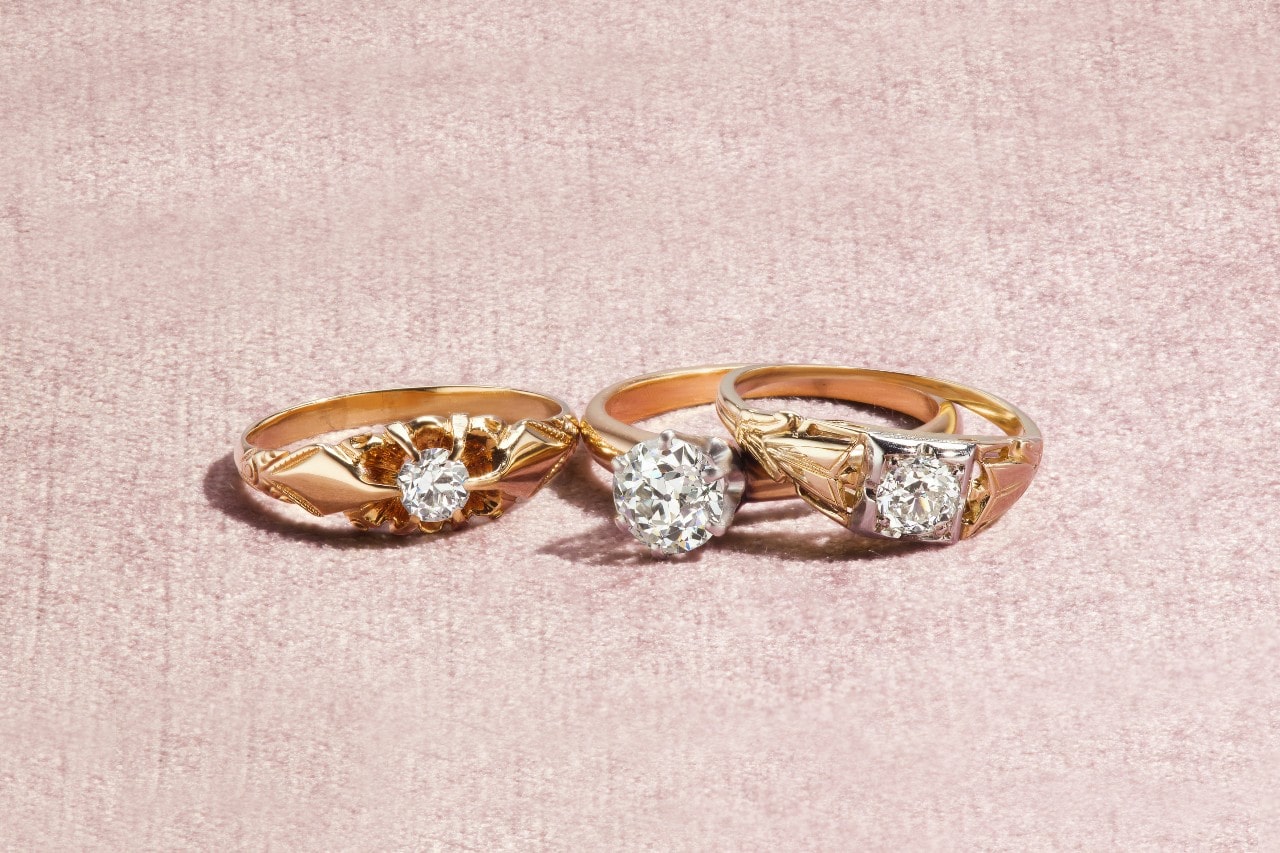three yellow gold solitaire engagement rings with intricate designs three yellow gold solitaire engagement rings with intricate designs